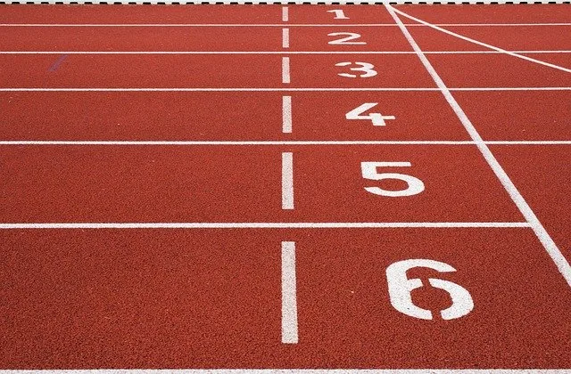 A red track with numbers painted on it.