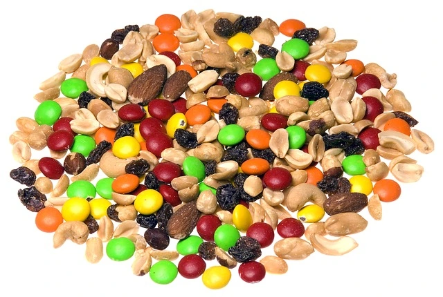 A pile of mixed nuts and nuts on a white background.